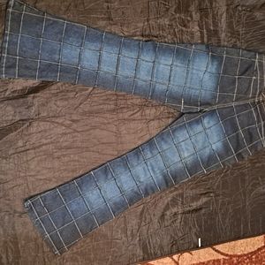 Lazer Stretch Jeans, size 11 W/ frayed stichwork.